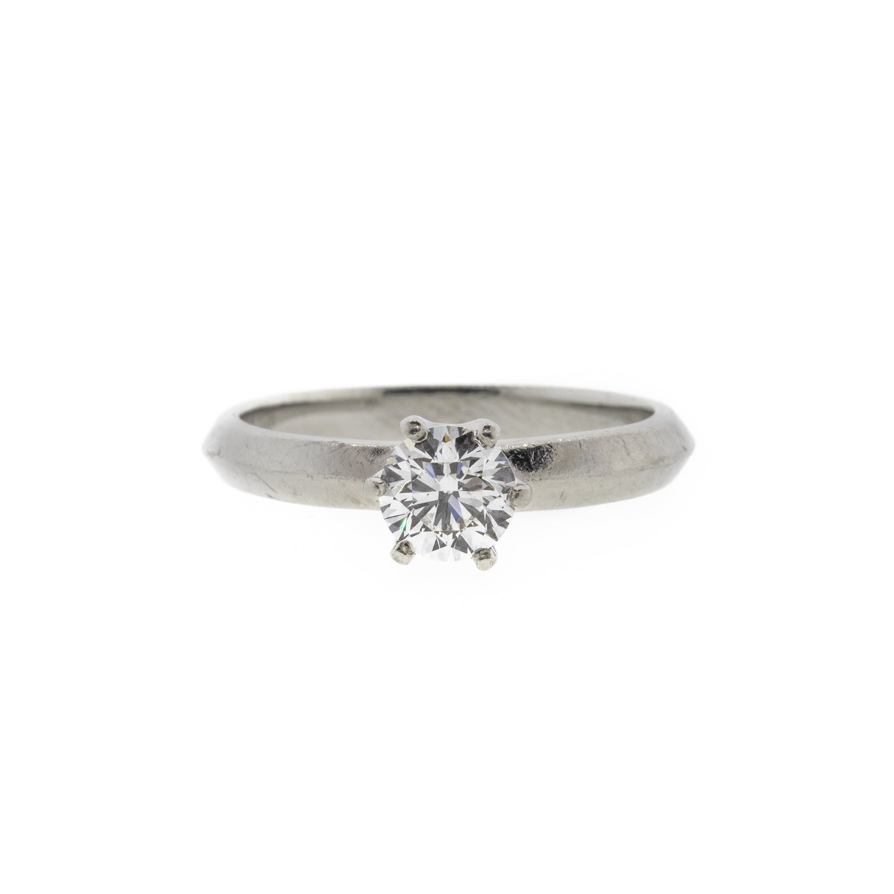 Round Brilliant Diamond and Knife Edge Platinum Ring