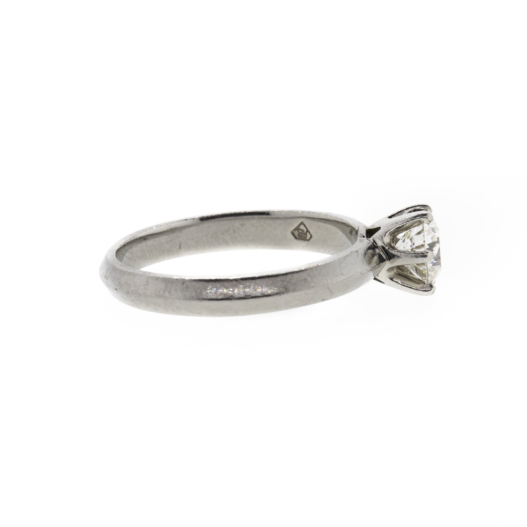 Round Brilliant Diamond and Knife Edge Platinum Ring